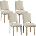 Lot de 4 fauteuils de repas beige avec dossier haut, tissu rembourre, pieds en bois massif et details decoratifs bronze